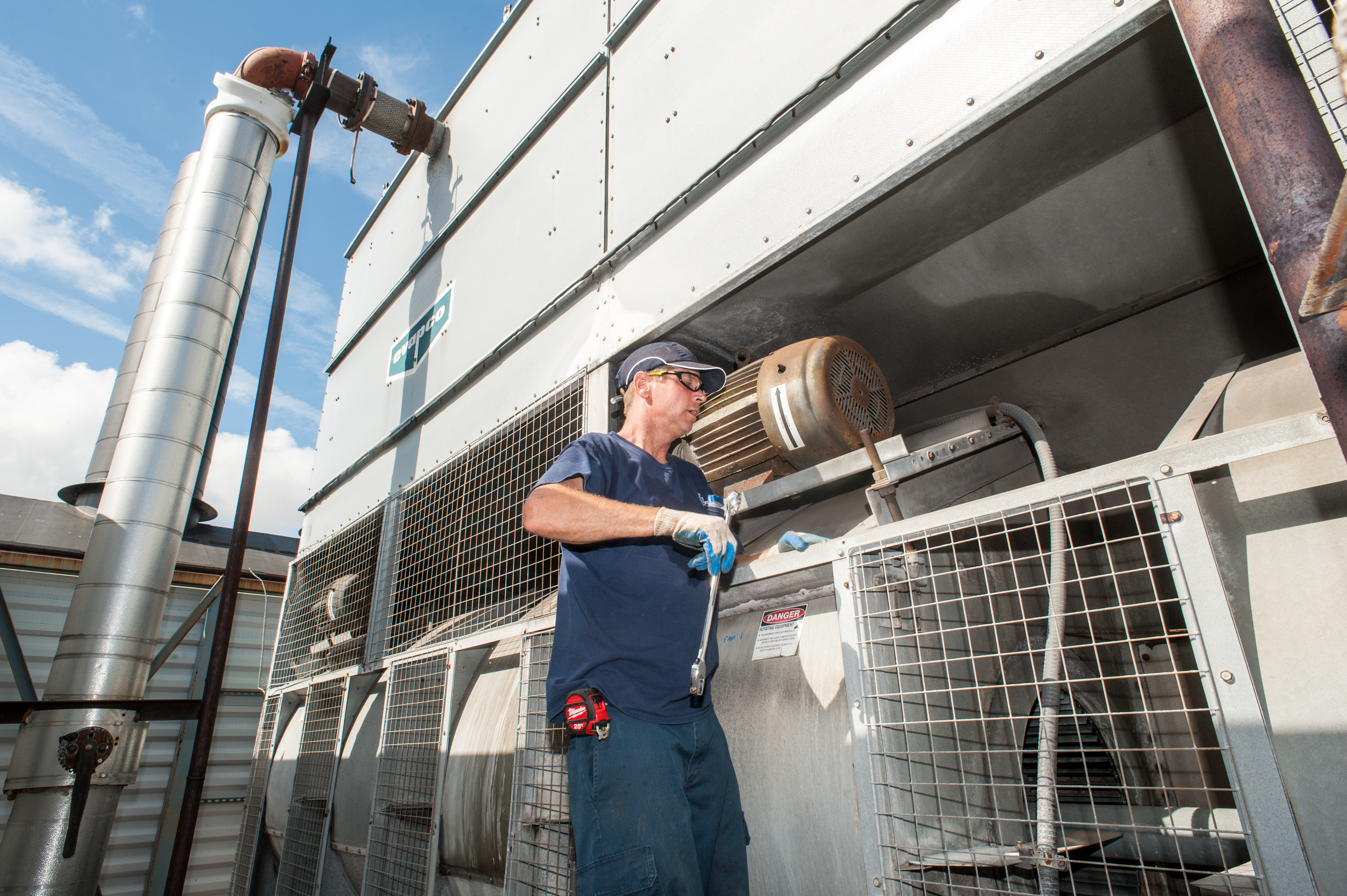 Mr. GoodTower Rep Servicing Cooling Equipment